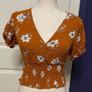 Paper Crane brand top size medium, orange with white flower print, rouched waist